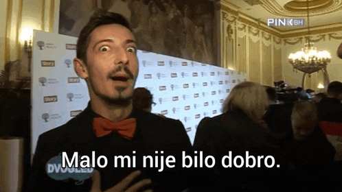 a man in a bow tie says malo mi nje bilo dobro