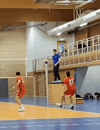 a basketball player with the number 27 on his shirt