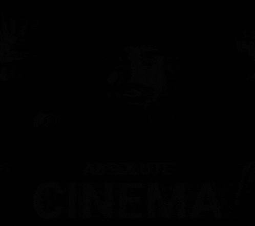 a black and white photo of a man with his hands in the air and the caption absolute cinema