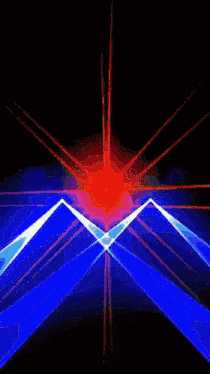 a can of heineken is being smashed by a beam of light