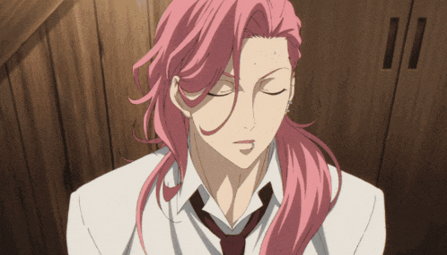 a man with pink hair and a white shirt and tie