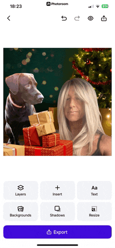 a phone screen shows a picture of a woman and a dog with the time 18:23
