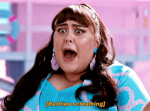 a woman with a surprised look on her face and the words barbies screaming