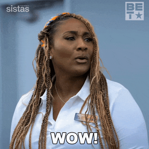 a woman wearing a name tag that says wow