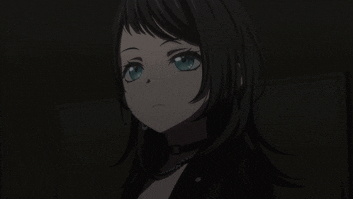 a girl with black hair and blue eyes is wearing a choker necklace and earrings