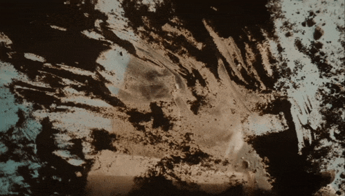 a close up of a dirty surface with a few spots