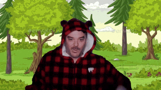 a man in a plaid hoodie with bear ears is in a forest