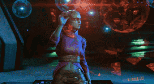 a woman in a purple shirt is standing in front of a globe