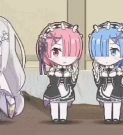 a group of three anime girls are standing next to each other .