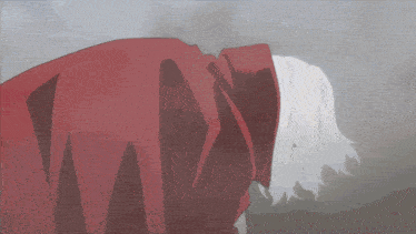 a person with white hair is wearing a red shirt