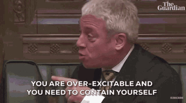 a man in a suit and tie says you are over-excited and you need to contain yourself