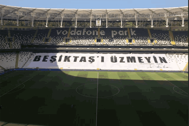 a soccer field with a banner that says vodafone park