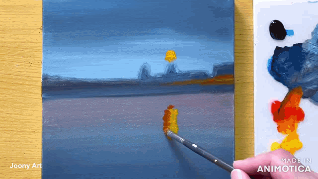 a person is painting a landscape with a brush and the words made in animatica on the bottom