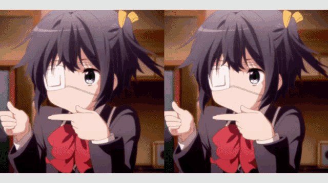 a girl with a bandage on her eye is pointing