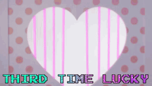 a sign that says third time lucky with a pink heart in the background