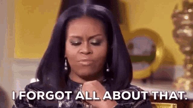michelle obama is making a funny face and saying `` i forgot all about that . ''