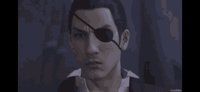 a man with an eye patch on his eye is looking at the camera in a video game .