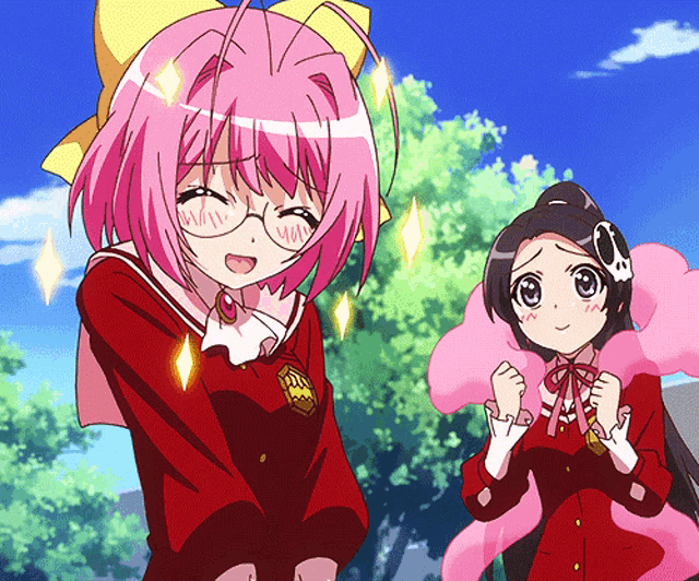 a girl with pink hair and glasses stands next to another girl with black hair