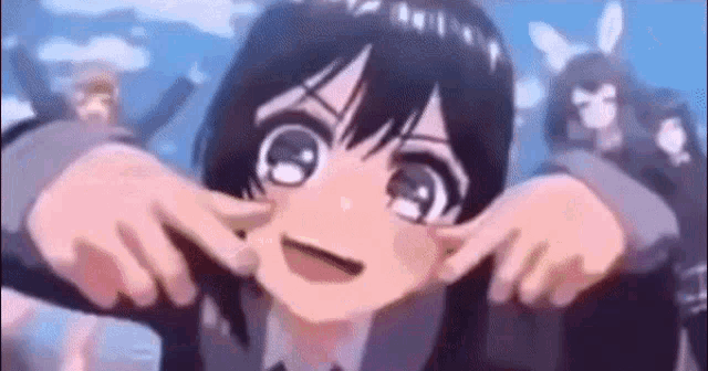 a close up of a anime girl making a funny face .