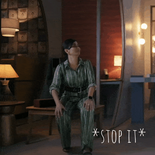 a woman is sitting on a bench with the words * stop it * written below her