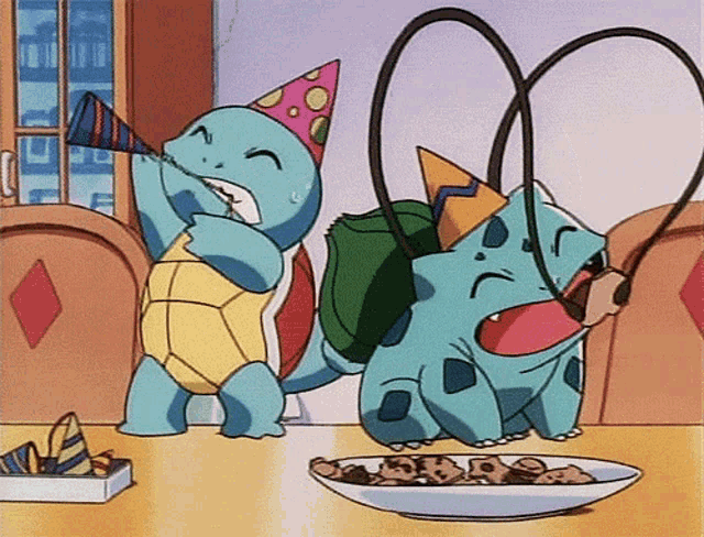 two cartoon characters wearing party hats are sitting at a table eating cookies