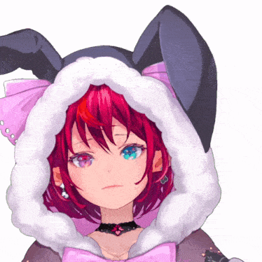 a girl with red hair is wearing a bunny hood