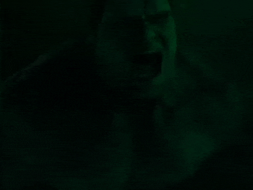 a close up of a green background with a blurred effect