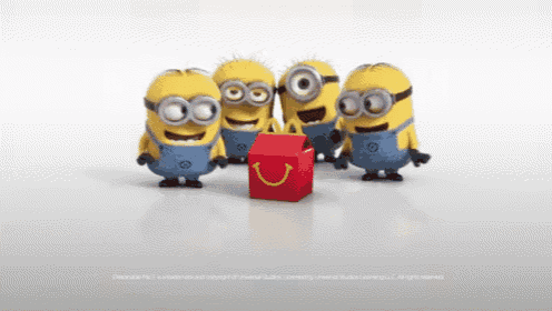 a group of minions standing around a red mcdonald 's happy meal