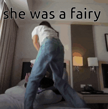 a woman standing on a bed with the words she was a fairy written above her