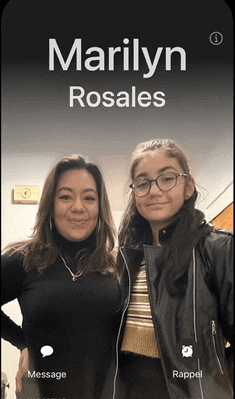 a phone screen shows two women standing next to each other and the name marilyn rosales on the top