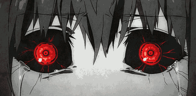 a close up of a person 's red eyes