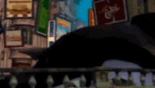 a cartoon character is flying through the air in a video game while holding an umbrella .