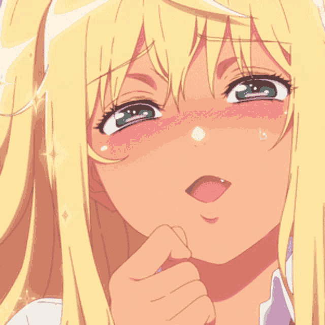 a girl with blonde hair and green eyes is smiling with her mouth open