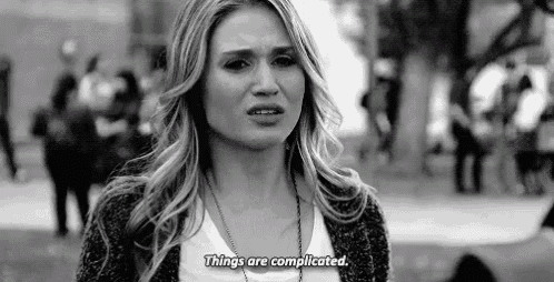 a black and white photo of a woman talking about things are complicated .