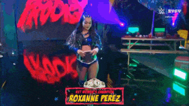 roxanne perez is a female wrestler with a belt