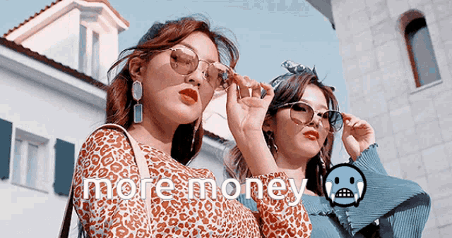 two women wearing sunglasses are standing next to each other with the words more money written above them