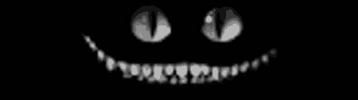 a black and white photo of a cat 's face with big teeth and glowing eyes .