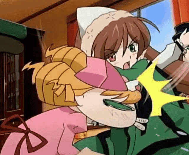 a girl in a pink dress is being punched in the face