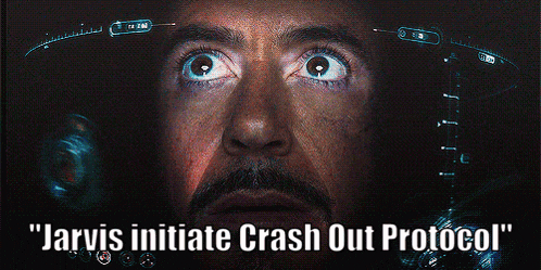 a close up of a man 's face with the words jarvis initiate crash out protocol