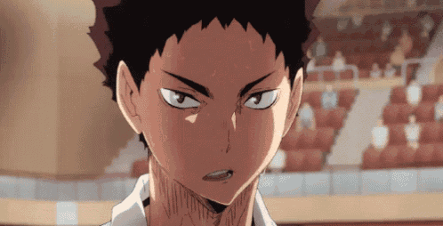 a close up of a person 's face with a serious look on their face in a stadium .