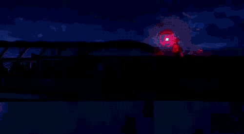 a blue light is shining in the dark