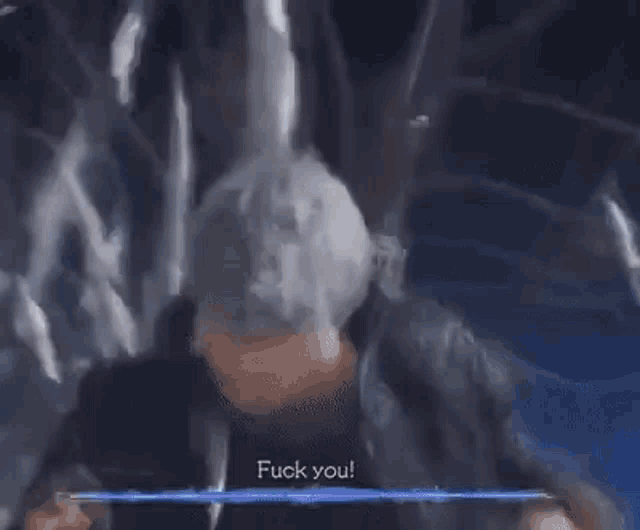 a man is giving the middle finger in a video game while standing in front of a monster .