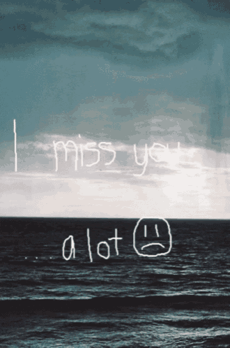 a drawing of the ocean with the words " i miss you a lot "