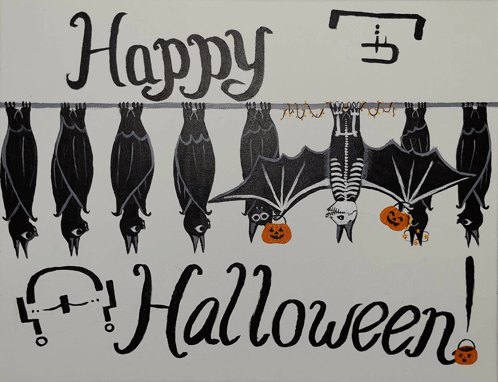 a drawing of bats hanging from a string with the words happy halloween