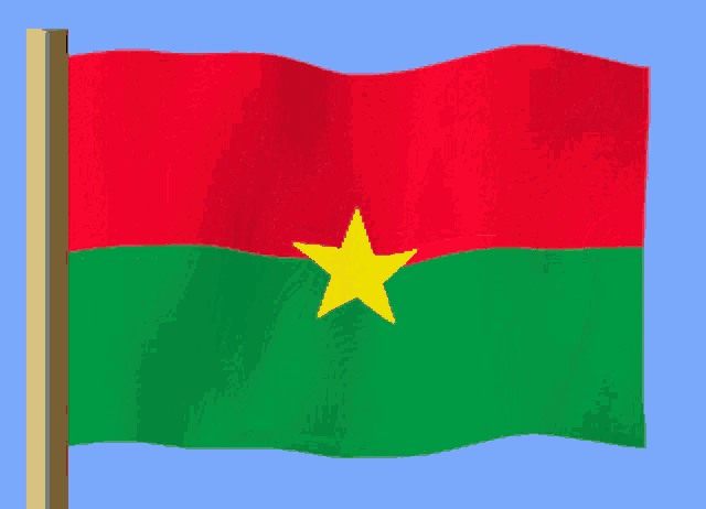 a green and red flag with a yellow star in the middle