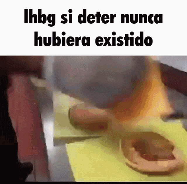 a gif of a person cutting a piece of meat with the words ihbg si deter nunca hubiera existido