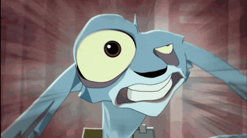 a close up of a cartoon character with a big yellow eye