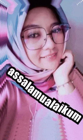a woman wearing glasses and a hijab says " assalamualaikum " on the bottom