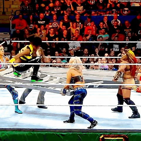 a wrestling ring with a ladder that says " the war " on it