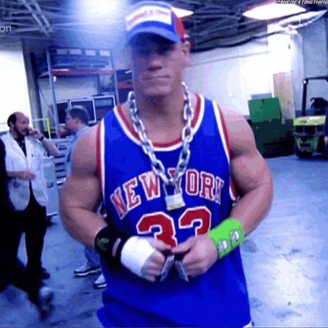 a man wearing a blue new york jersey number 32
